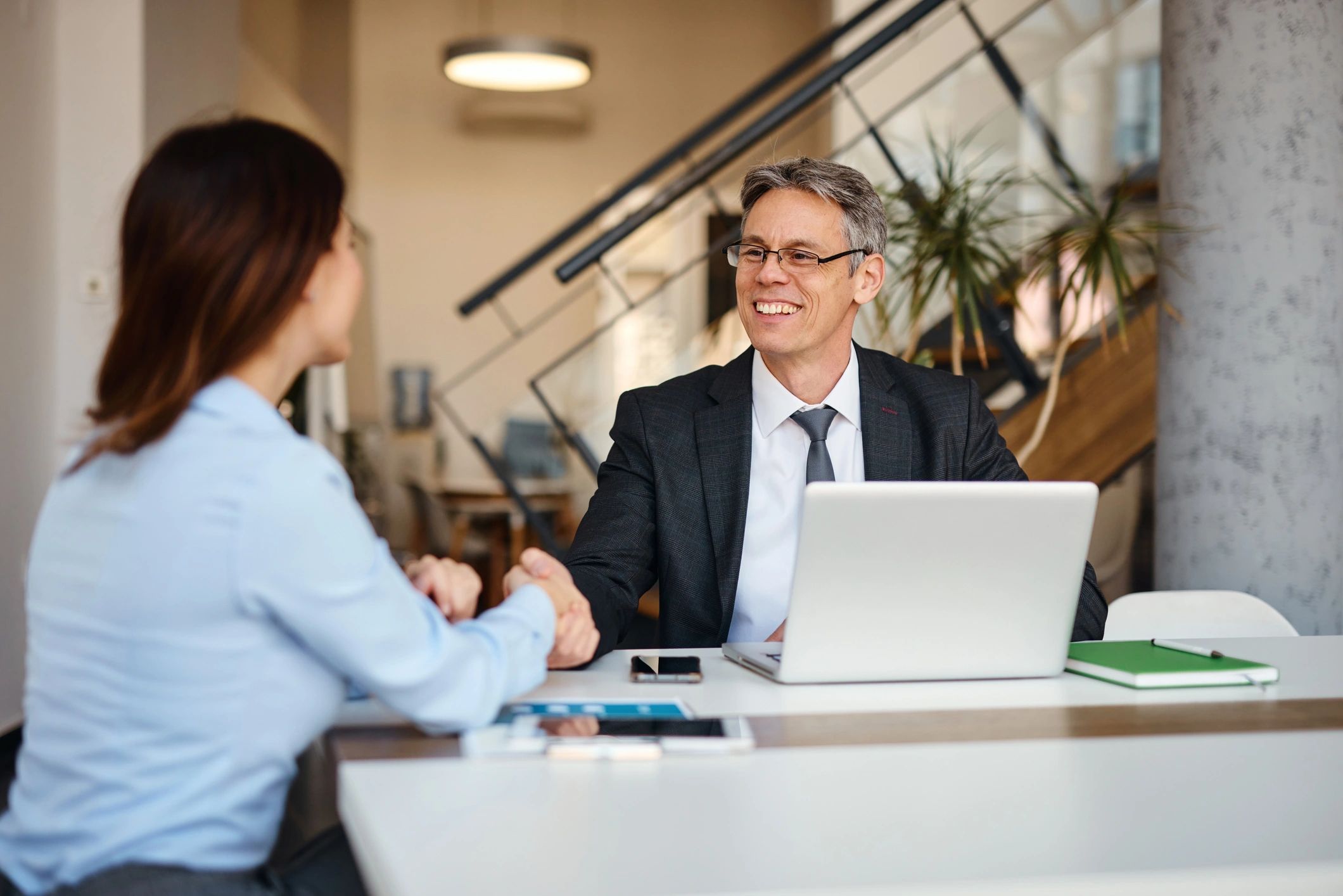 Professionals meeting to review a project plan